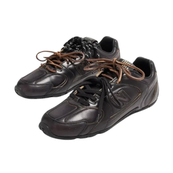 Untitled-design-2025-03-08T140842.298.webp New Balance 530 SL – Miu Miu Black Patent