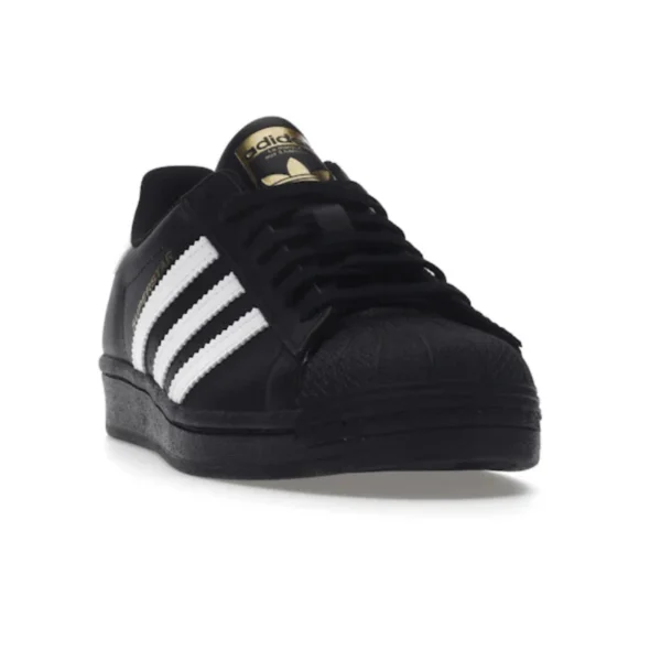 Untitled-design-2025-03-10T122600.996.webp Adidas Superstar Core – Black Cloud White Gold